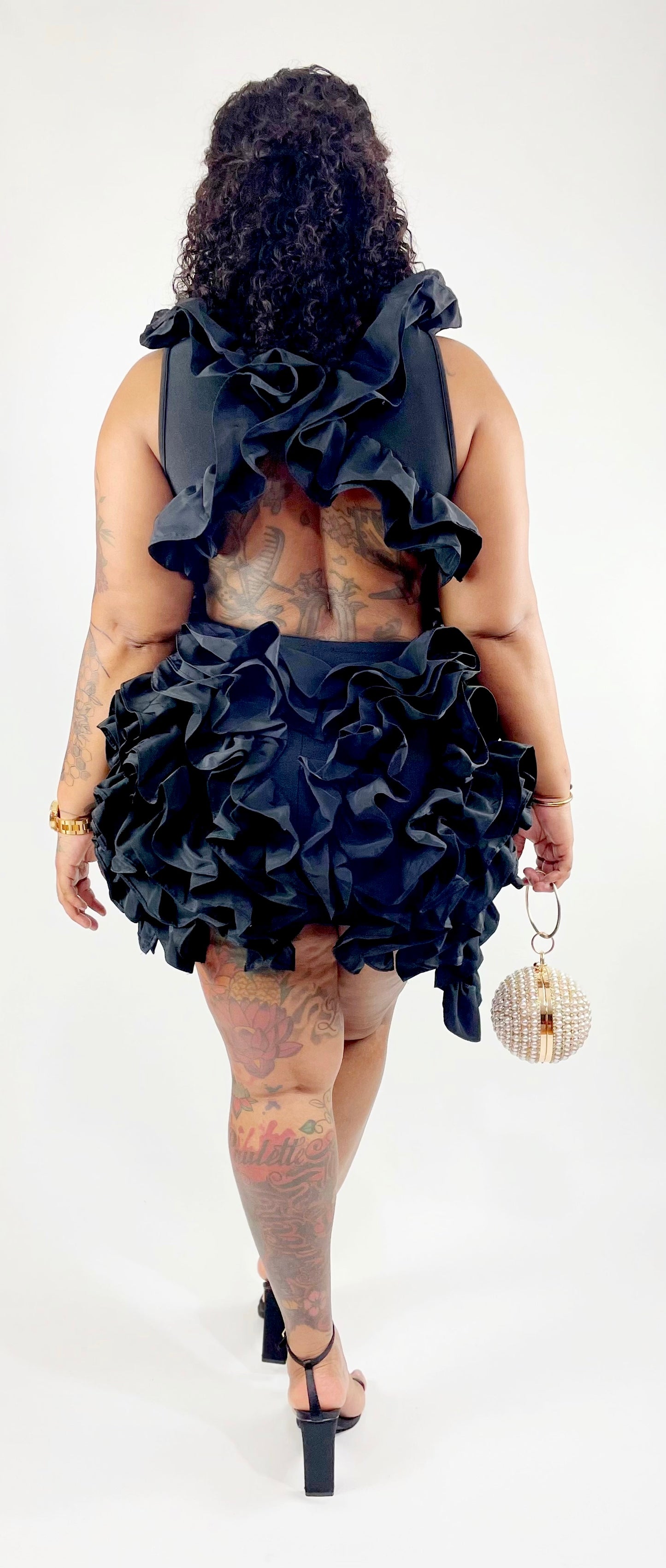 Black Beauty In Ruffle Dress