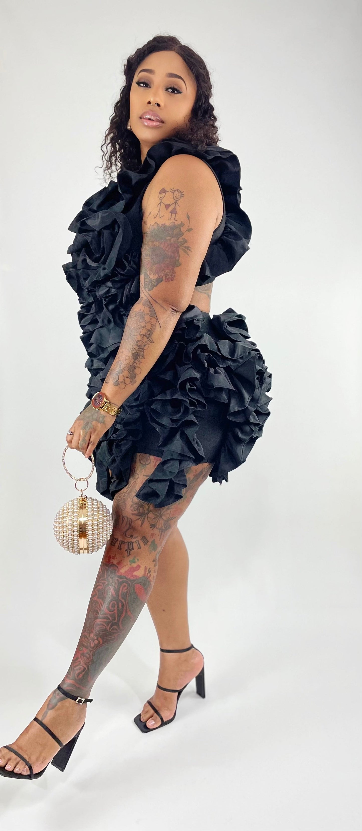 Black Beauty In Ruffle Dress